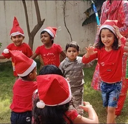 A collection of joyous moments from our Christmas party, including dancing, enjoying cupcakes, building a sand snowman, and posing for group photos.