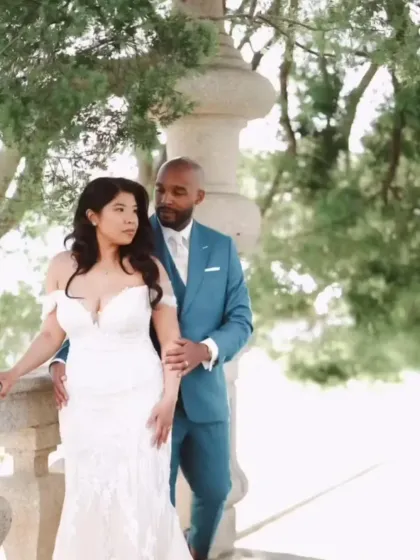 A modern take on wedding attire. This groom stands out in a custom-fitted rich teal suit, a bold and refreshing choice that perfectly complements the special day while showcasing his unique style.