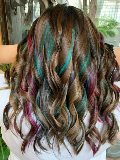 The back view of the 'Gems and Chocolate' look, showing the full effect of the rainbow peekaboo highlights.
