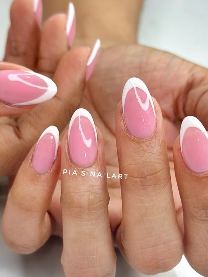 A fun twist on the classic French, using an aqua pink base with the traditional crisp white tip for a pop of color.