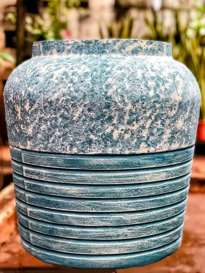 Yes, we sell pots! This concrete beauty with a distressed blue finish is just one example of the unique planters you can find at our studio or through our brand, Terrapotta.