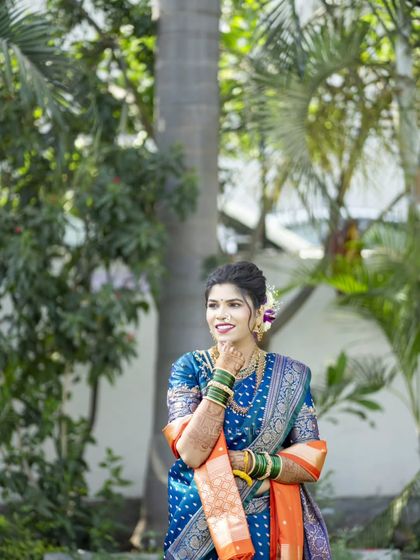 A lovely outdoor bridal portrait, with the bride looking away in a moment of thought.
