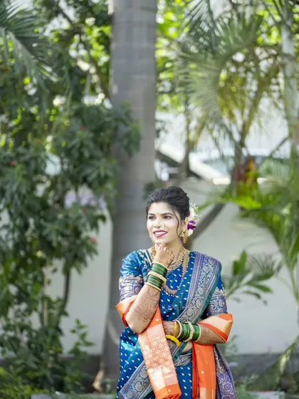 A lovely outdoor bridal portrait, with the bride looking away in a moment of thought.