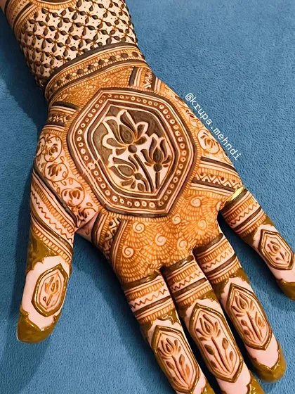 A modern design featuring a central lotus motif. The geometric patterns and clean lines give it a contemporary feel, perfect for any festival or event.