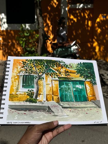 Painting the colorful buildings of White Town, Pondicherry. I love the combination of yellow, orange, and green, and the beautiful dappled light.