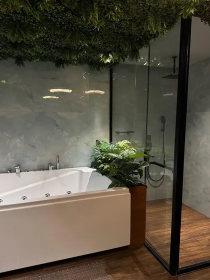 Experience a private spa retreat in your own home. The combination of a jacuzzi tub and our unique grass ceiling installation creates an unparalleled atmosphere of relaxation and luxury.