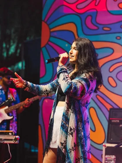 A side-stage view from our concert in Indore. We perform a mix of high-energy pop, rock, and Bollywood fusion to keep the crowd engaged.