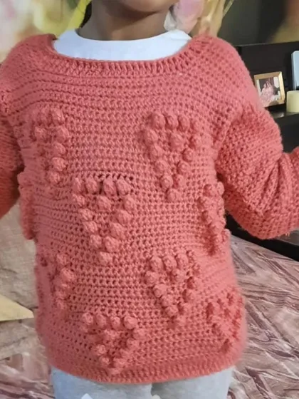 This cozy bobble-stitch heart sweater was one of the first big projects I made for my daughter. Crafted with incredibly soft yarn, it’s designed to be a warm hug she can wear. It’s a reminder of where my journey began and the love that’s woven into every stitch.