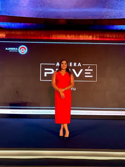 A full view of the stage for the Ajmera Realty launch event.