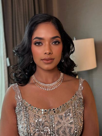 A goddess glow for this reception bride. I love working with dusky skin tones, creating a luminous, bronzed look that highlights the skin's natural richness.