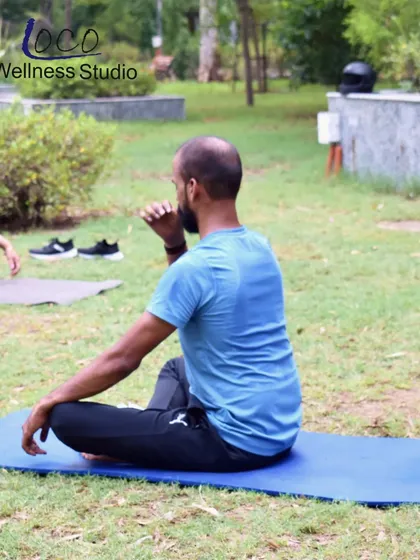 Yoga is a practice of both movement and stillness. This photo captures a moment of mindful focus during an outdoor yoga class, where we work on spinal twists to improve flexibility and aid digestion.