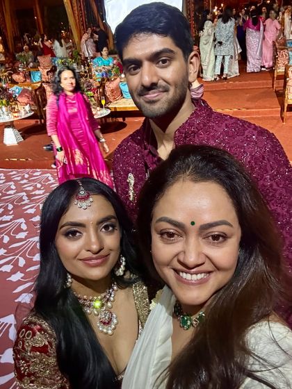 A happy selfie with a radiant bride and groom. Seeing my patients glow with confidence on their wedding day is the ultimate reward.