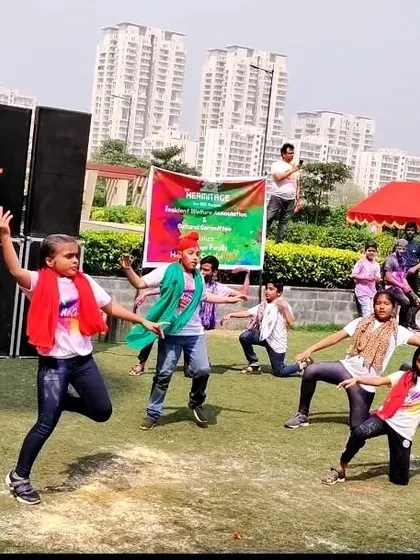 Our students performing outdoors for a Holi festival event. The energy and colors of Holi make for a truly joyful dance experience.