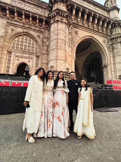 Another group photo with our team and students at the iconic Gateway of India stage.