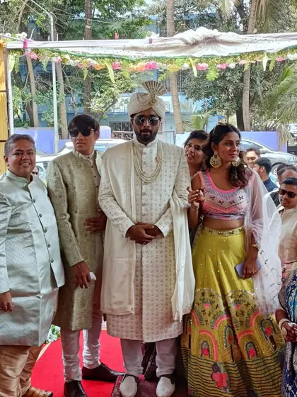 The groom's arrival, a moment of anticipation and excitement before the main ceremony.