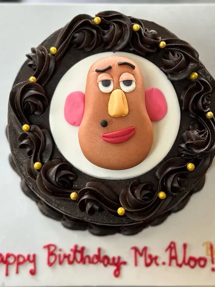 A fun, custom-designed cake featuring Mr. Potato Head for a birthday celebration. I can create cakes based on your favorite characters and inside jokes.