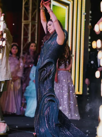 A high-energy moment from the team bride performance. The coordination and joy on their faces is what it's all about.