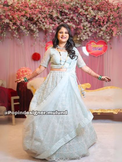 The bride-to-be looking radiant and happy in her light blue engagement gown. The full flare of the skirt is perfect for twirling photos.