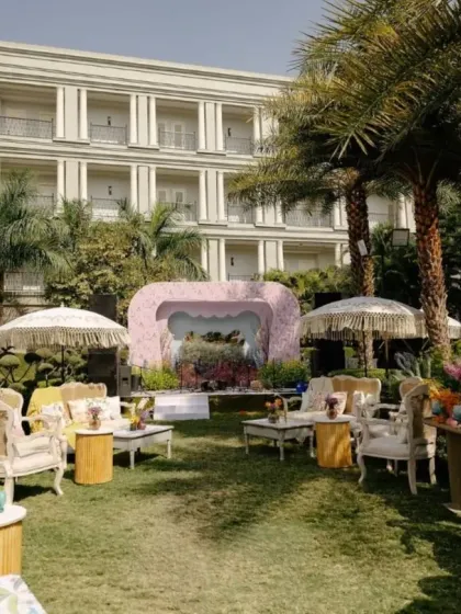 A wider view of the personalized Mehendi garden party, with chic lounge areas set up for guests to relax and enjoy the afternoon.