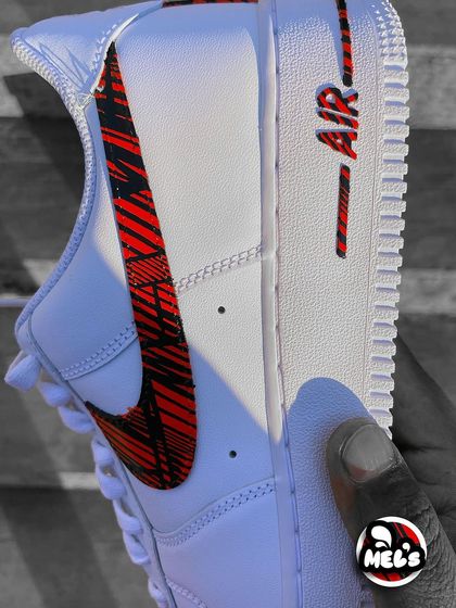 A close-up of the patterned swoosh on the MotoGP custom Nike.