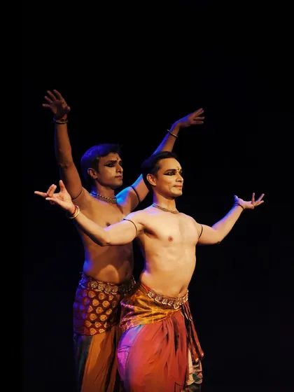 A moment of synchronicity in 'ATAH', where our poses mirror each other, creating a sense of unity.