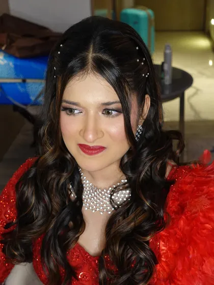 A portrait of Amileen looking elegant and poised, ready for her Sangeet performance.