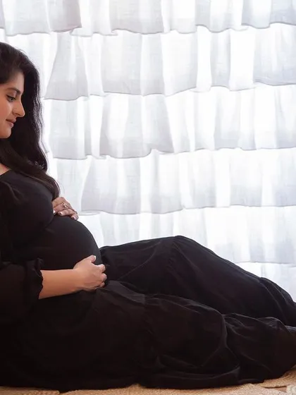 A simple, classic pose can be so powerful. This color portrait, taken in my studio, focuses on the beautiful bond between mother and baby, with soft lighting creating a warm and intimate feel.