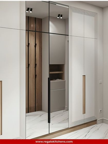 A practical and stylish entryway wardrobe with a full-length mirror. We included open hooks and shelving for quick access to coats and shoes.