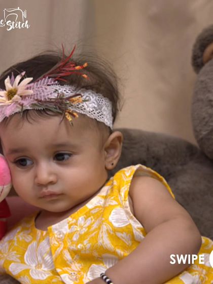 This little one looks so serene in our yellow floral jhabla, surrounded by her favorite toys. Comfort is key for happy babies.
