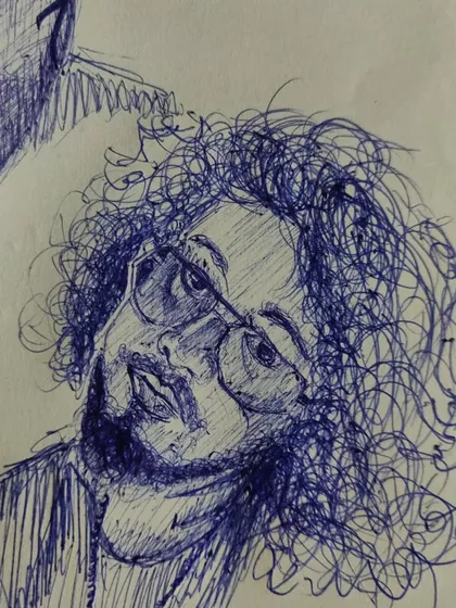 A quick portrait sketch done with a ballpoint pen. I used loose, curly lines to capture the texture of the hair.