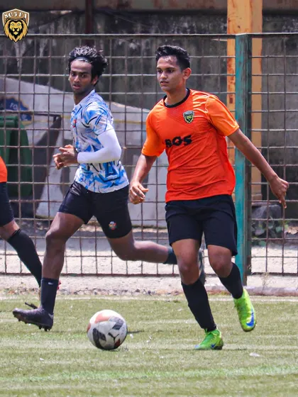 A player on the run, showcasing the dynamic and fast paced style of football we encourage.