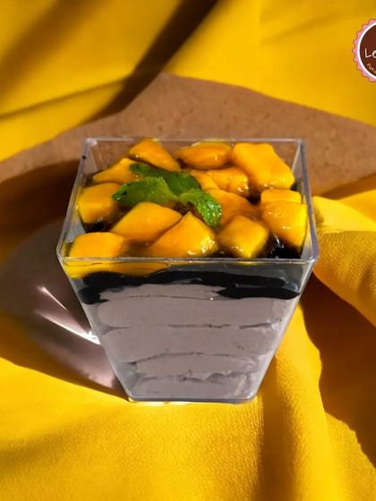For those who love both chocolate and mango, I offer this Chocolate Mango Mousse cup. It has a layer of chocolate mousse topped with fresh mango chunks for a perfect balance of flavors.