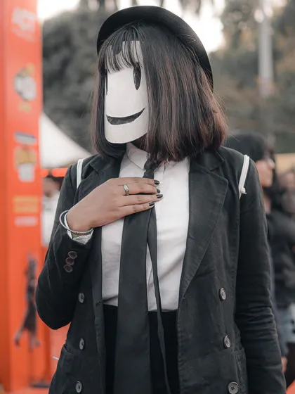 Another take on the Sniper Mask cosplay, highlighting the posture and details of the full outfit.
