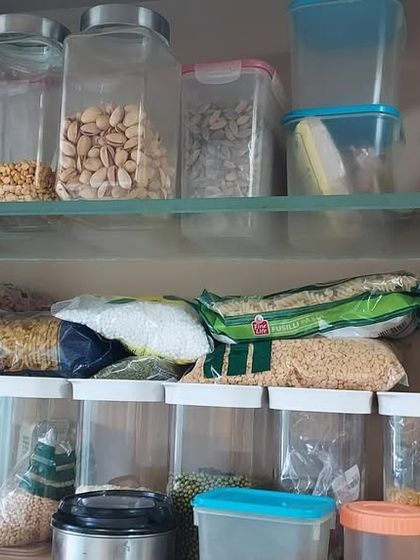 This 'before' picture is a familiar sight in many kitchens, with open packets and mismatched containers creating clutter. It highlights the exact problem my virtual service solves: turning this kind of disorganization into a streamlined, functional system.