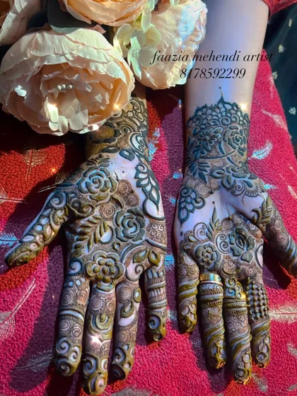 A beautiful henna design for an amazing person, Al Kausar Makeovers. This design features shaded roses and intricate details.