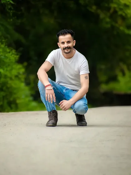 A simple, direct portrait in a natural outdoor setting. This kind of shot is great for capturing a person's character in a relaxed way.