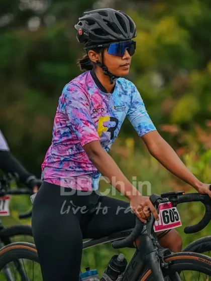 A female cyclist looking focused and determined. Every race is an opportunity to push your limits and achieve new personal bests.