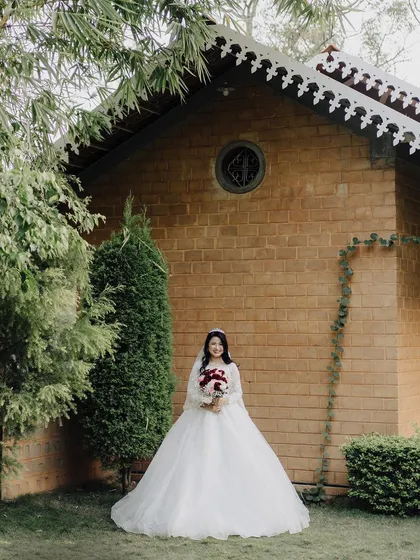 There is a unique serenity to a Christian wedding. I aim to capture the elegance and grace of the bride in her gown, using the classic architecture and natural light to create a portrait that feels both timeless and personal.