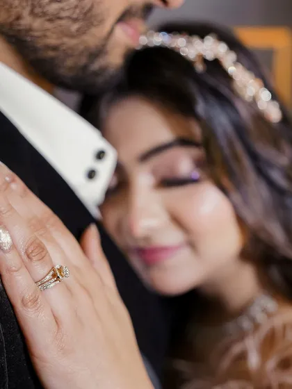 An intimate close-up capturing the deep affection between the couple. Amidst the celebration, we find these quiet moments that speak volumes about your bond.