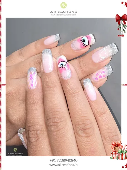 A final look at this creative holiday set, showing how the different elements like glitter, color, and hand-painted art come together on these long square nails.