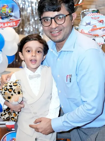 A proud dad with his son on his birthday. These are the heartwarming moments I love to see.
