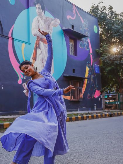 A moment of joy and reverence, dancing in front of the beautiful mural of my guru, Pt. Birju Maharaj ji. His legacy lives on in every beat and every movement.