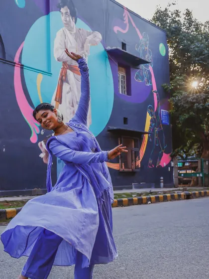 A moment of joy and reverence, dancing in front of the beautiful mural of my guru, Pt. Birju Maharaj ji. His legacy lives on in every beat and every movement.
