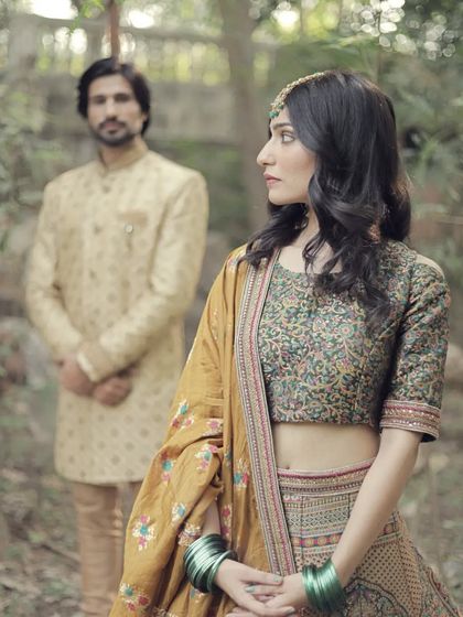 A close-up of the bride-to-be in our printed lehenga, showing the subtle details and elegant design.