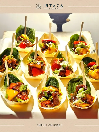 Chilli Chicken served in individual leaf-shaped, biodegradable bowls. This is another example of my commitment to both beautiful presentation and eco-friendly options.