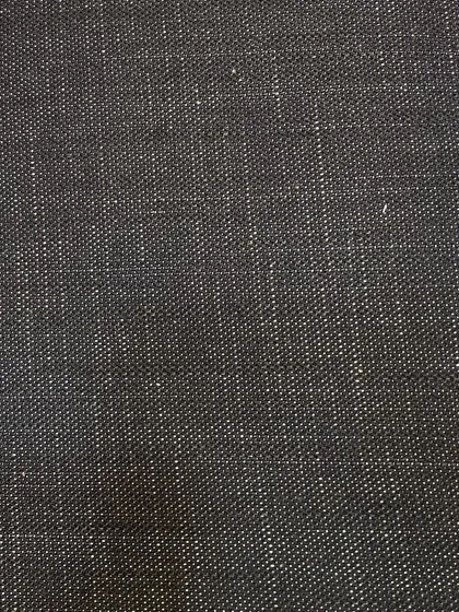 A black denim fabric with a visible white weft. This is often called "salt and pepper" denim and is great for a pair of non-blue jeans.