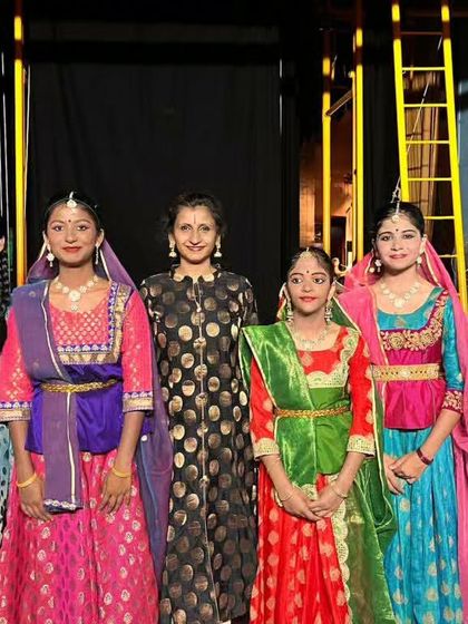 A picture with my junior students backstage. It's a joy to guide these young dancers and see them blossom on stage.