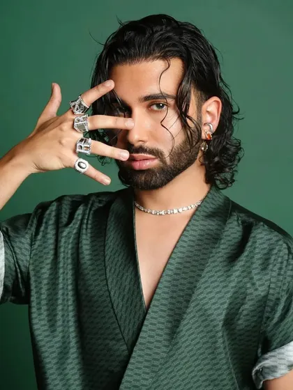 A close-up of the edgy look I styled for Orry for his GQ feature. The focus was on his confident persona, highlighted by statement rings and a modern hairstyle.