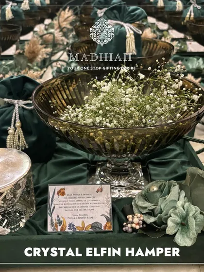 The Crystal Elfin Hamper brings a touch of magic to any wedding season. The smoked crystal bowl and silver jar create an enchanting and elegant gift.