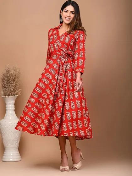 The women's red Jaipuri print kurti dress, styled with heels for a more formal look.